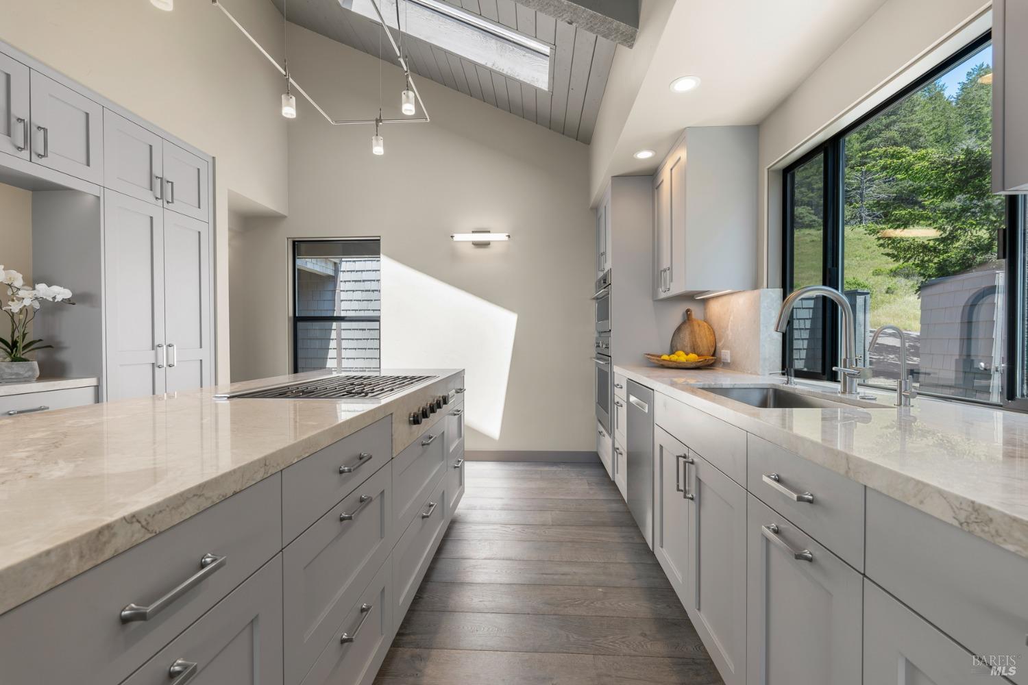 Undisclosed Address The Sea Ranch, CA 95497 - Photo 16 of 46 a large white kitchen with a large window