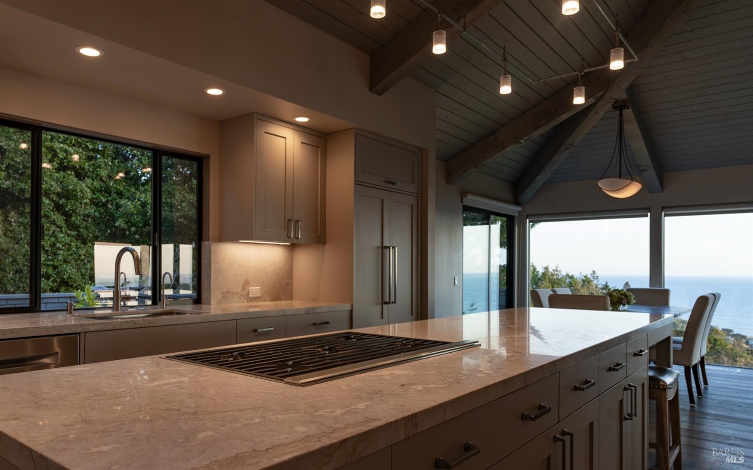 Undisclosed Address The Sea Ranch, CA 95497 - Photo 18 of 46 a kitchen with stainless steel appliances granite countertop sink stove and cabinets