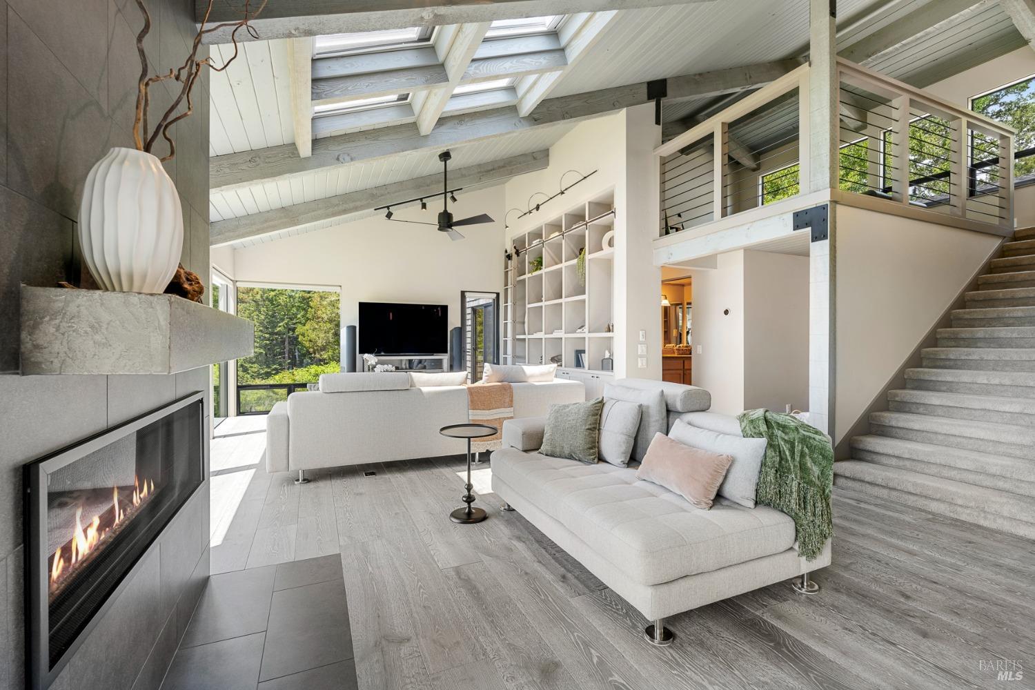 Undisclosed Address The Sea Ranch, CA 95497 - Photo 30 of 46 a living room with furniture fireplace and flat screen tv