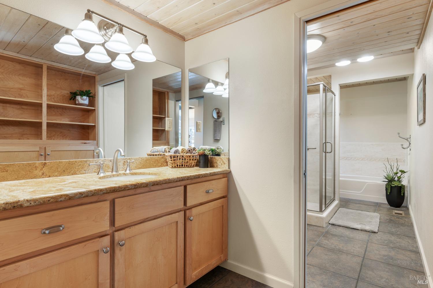 Undisclosed Address The Sea Ranch, CA 95497 - Photo 34 of 46 a bathroom with a double vanity sink and a mirror