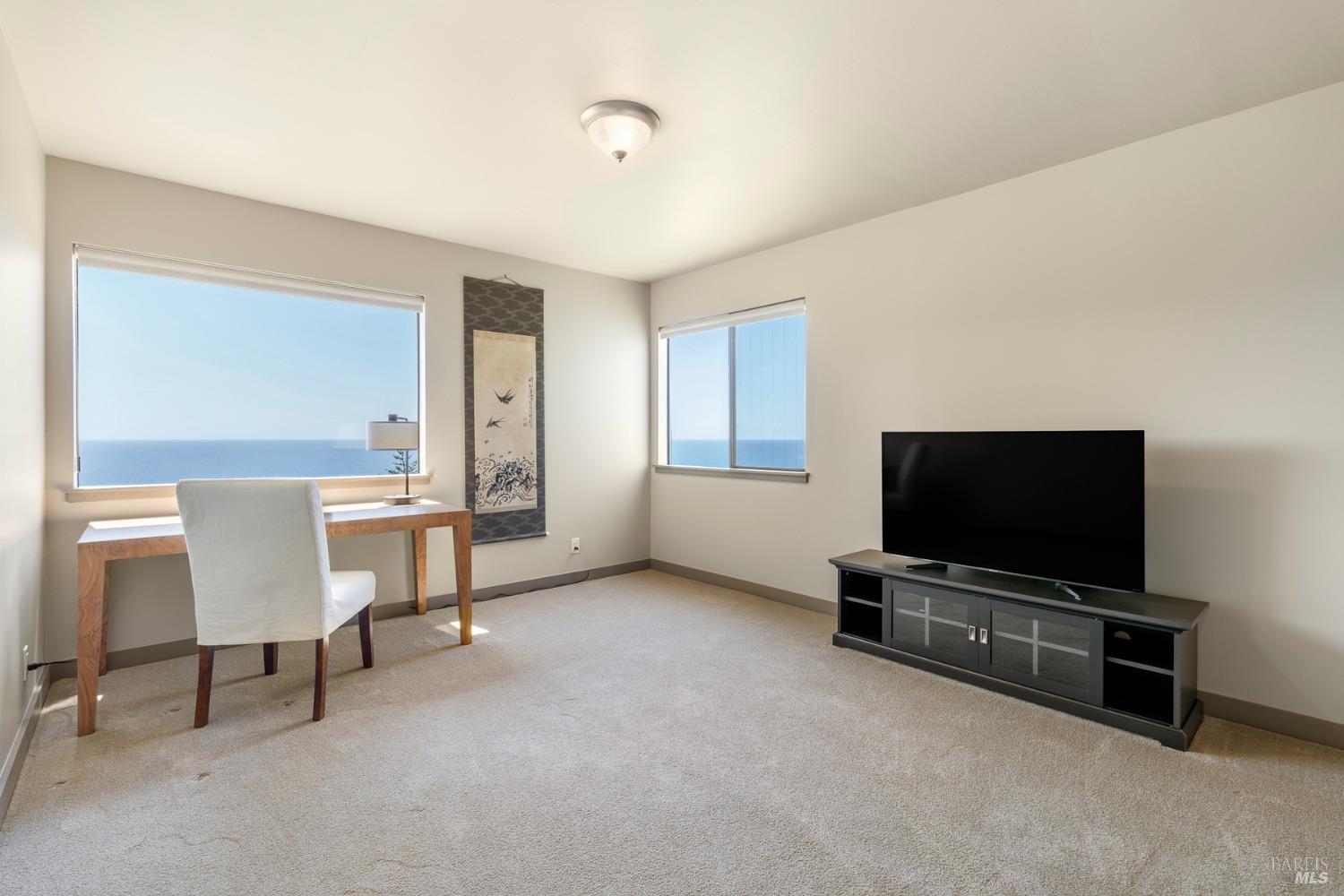 Undisclosed Address The Sea Ranch, CA 95497 - Photo 39 of 46 a view of a livingroom with furniture and a flat screen tv