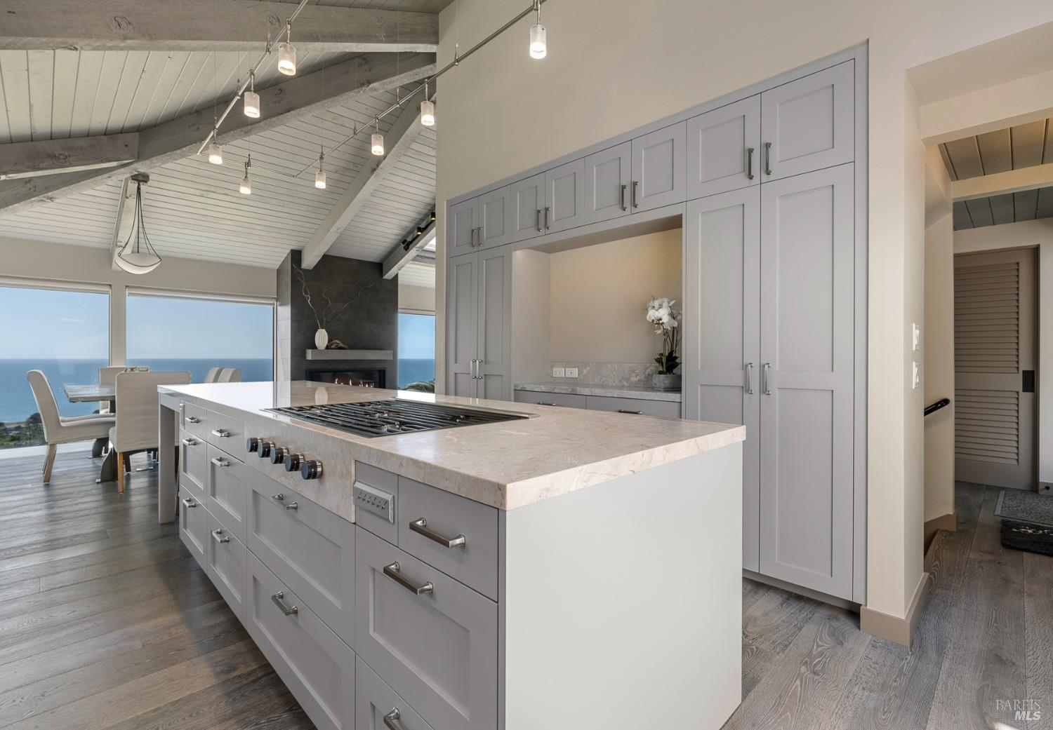 Undisclosed Address The Sea Ranch, CA 95497 - Photo 4 of 46 a kitchen with a stove and a wooden floors