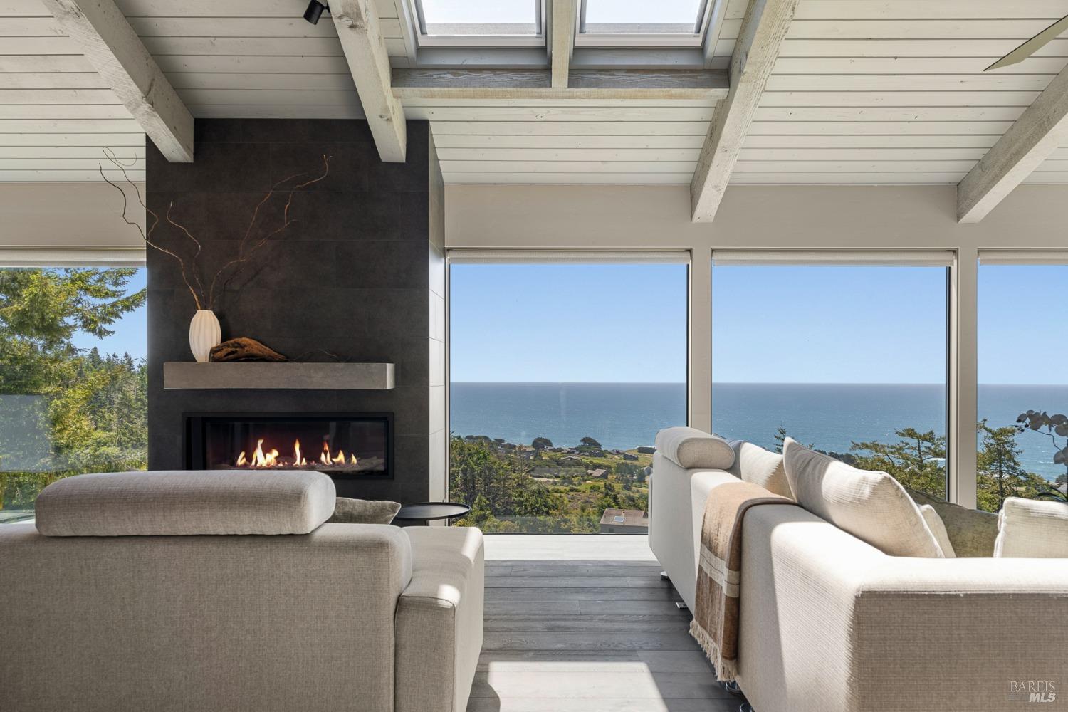 Undisclosed Address The Sea Ranch, CA 95497 - Photo 6 of 46 a view of a balcony with furniture and a fireplace