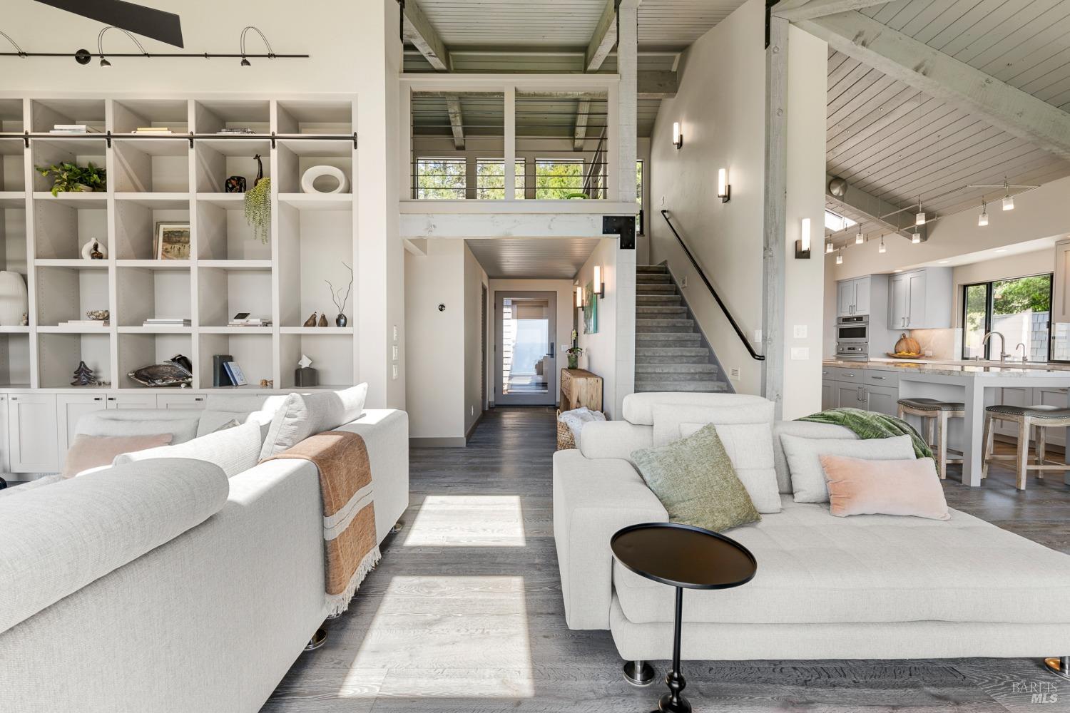 Undisclosed Address The Sea Ranch, CA 95497 - Photo 8 of 46 a living room with furniture and a floor to ceiling window
