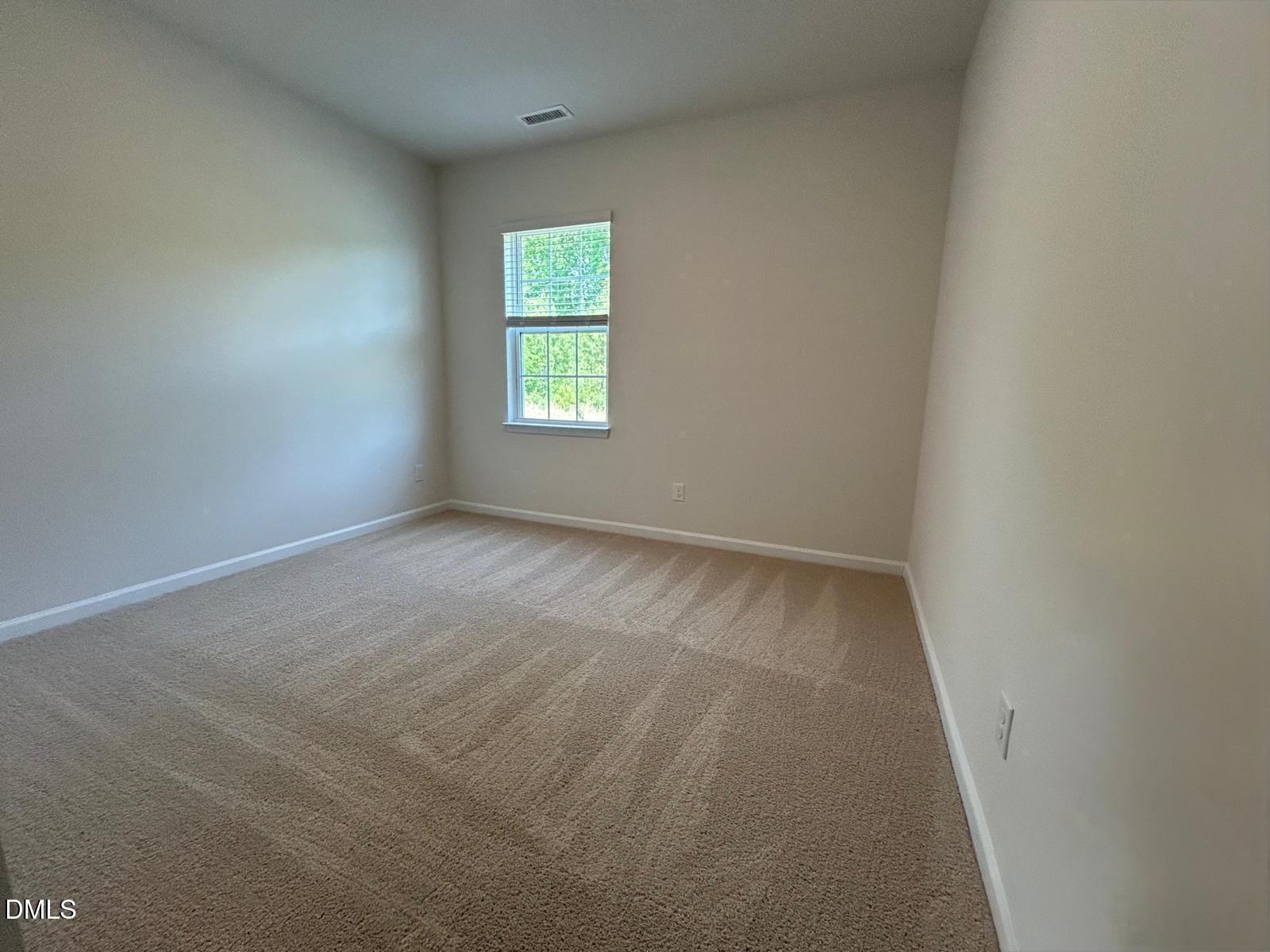 2264 Fletchers Ridge Drive Durham, NC 27703 - Photo 13 of 41 13. Bedroom 1 at main level with the vie