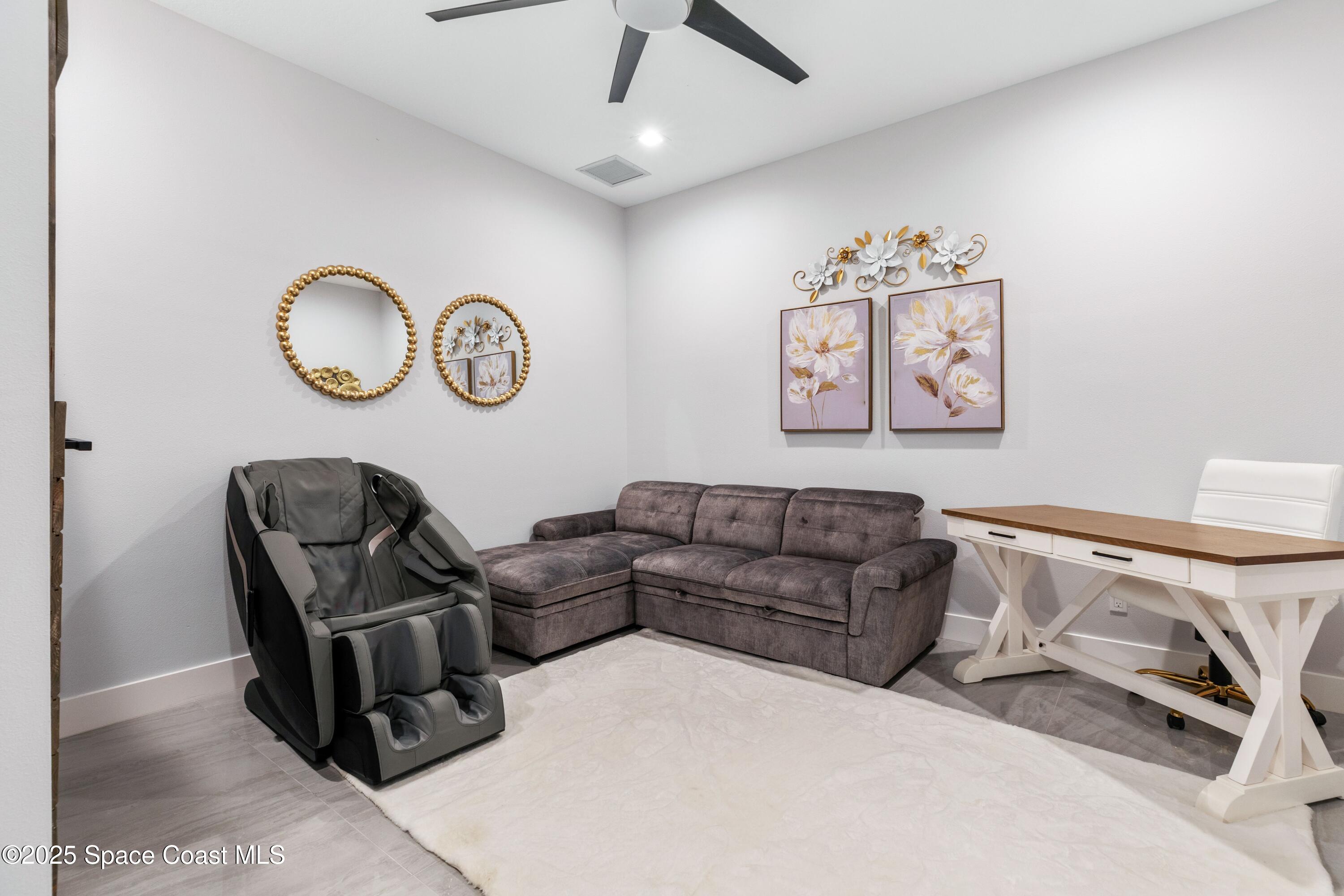 1420 Corey Road Malabar, FL 32950 - Photo 18 of 35 a living room with furniture