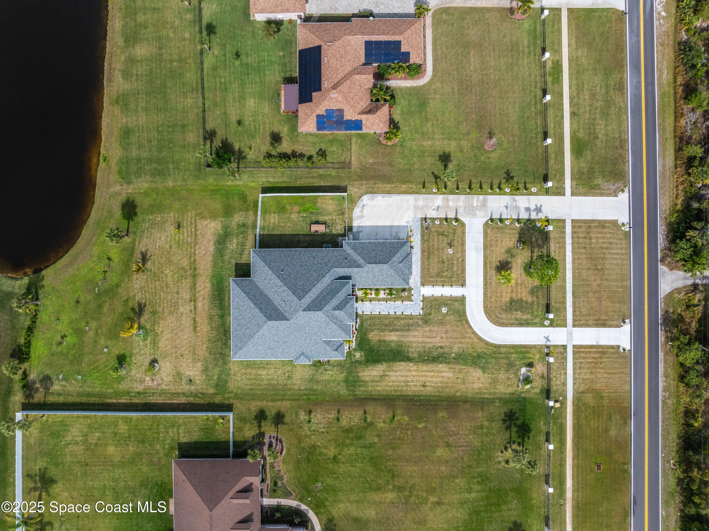 1420 Corey Road Malabar, FL 32950 - Photo 34 of 35 view of a balcony with outdoor view