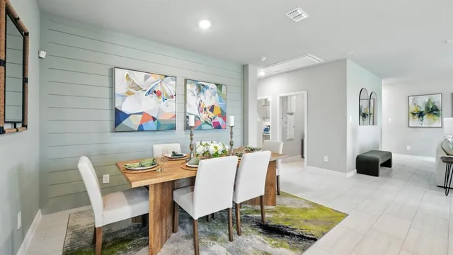 a kitchen with cabinets stainless steel appliances and a sink