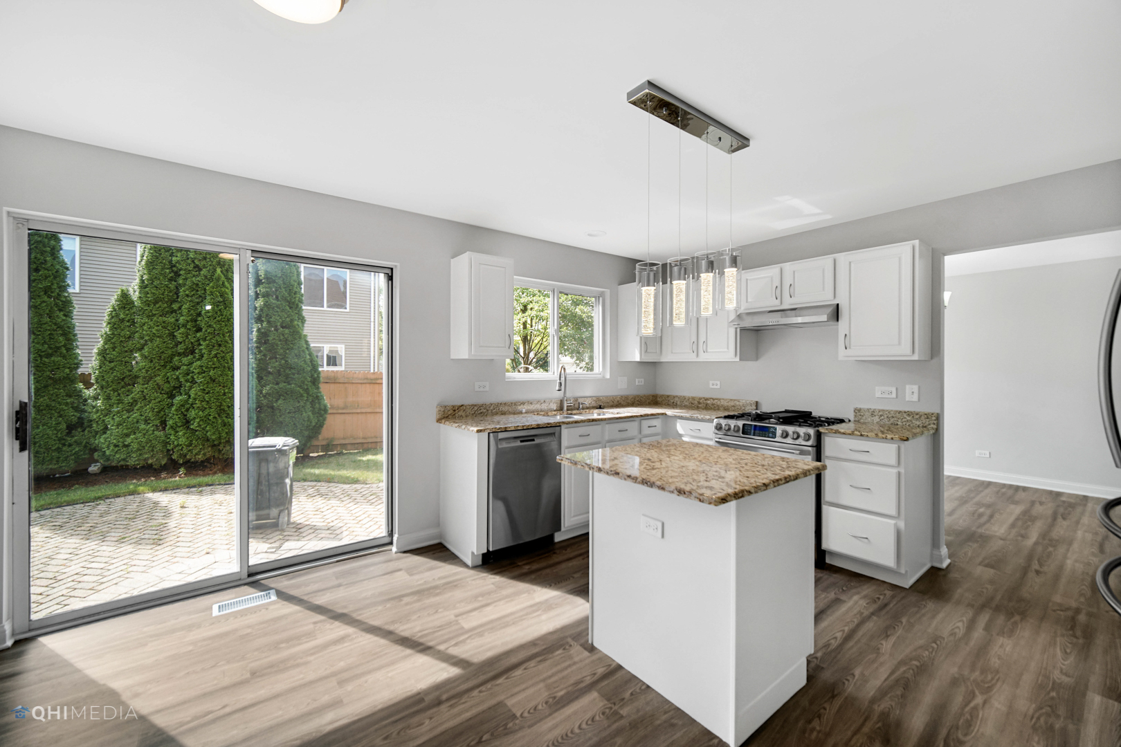 3101 Bennett Place Aurora, IL 60502 - Photo 11 of 30 a kitchen with a stove a sink and a refrigerator