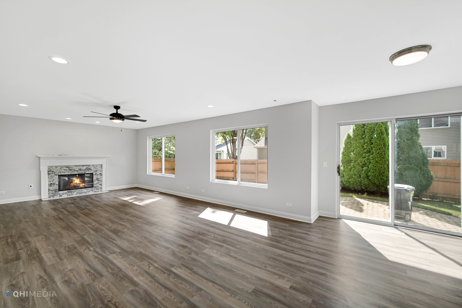 3101 Bennett Place Aurora, IL 60502 - Photo 14 of 30 an empty room with wooden floor and windows