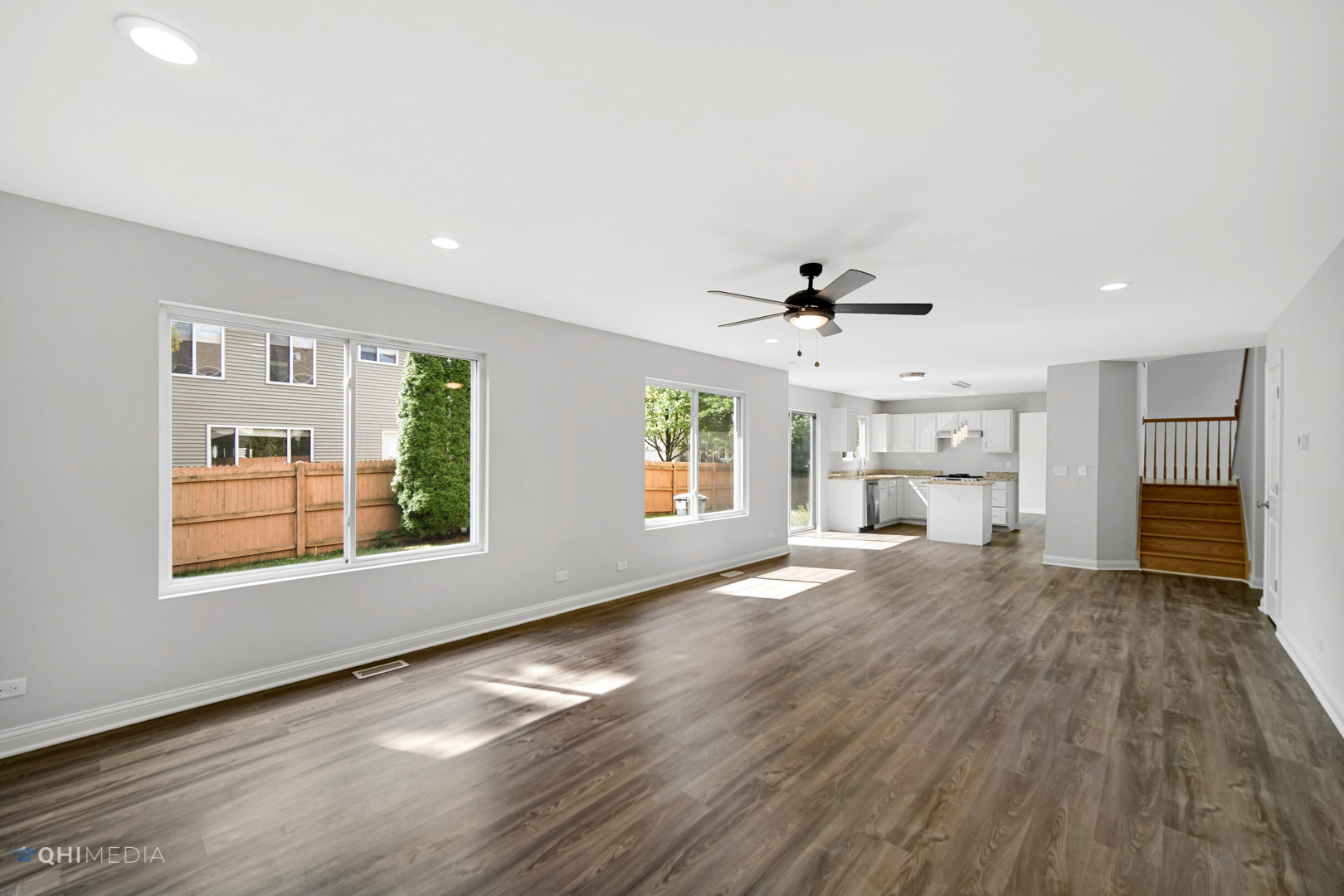3101 Bennett Place Aurora, IL 60502 - Photo 15 of 30 a view of empty room with wooden floor and fan