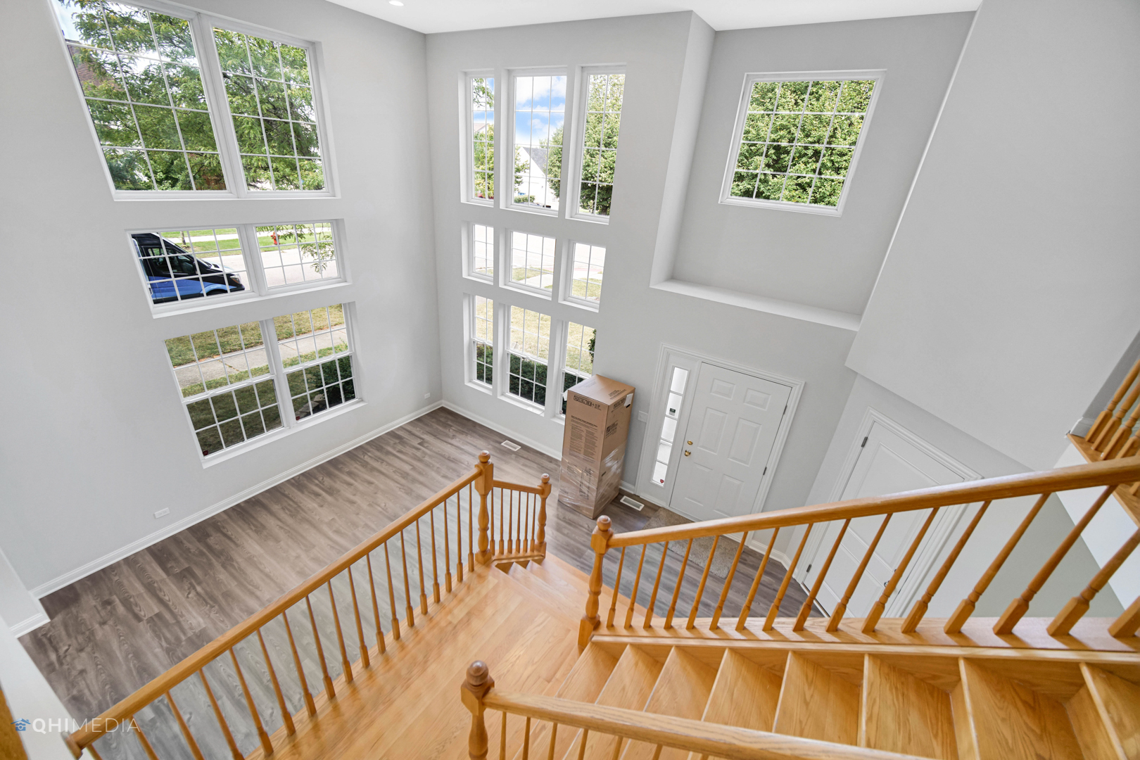 3101 Bennett Place Aurora, IL 60502 - Photo 16 of 30 a view of an empty room with wooden floor and windows
