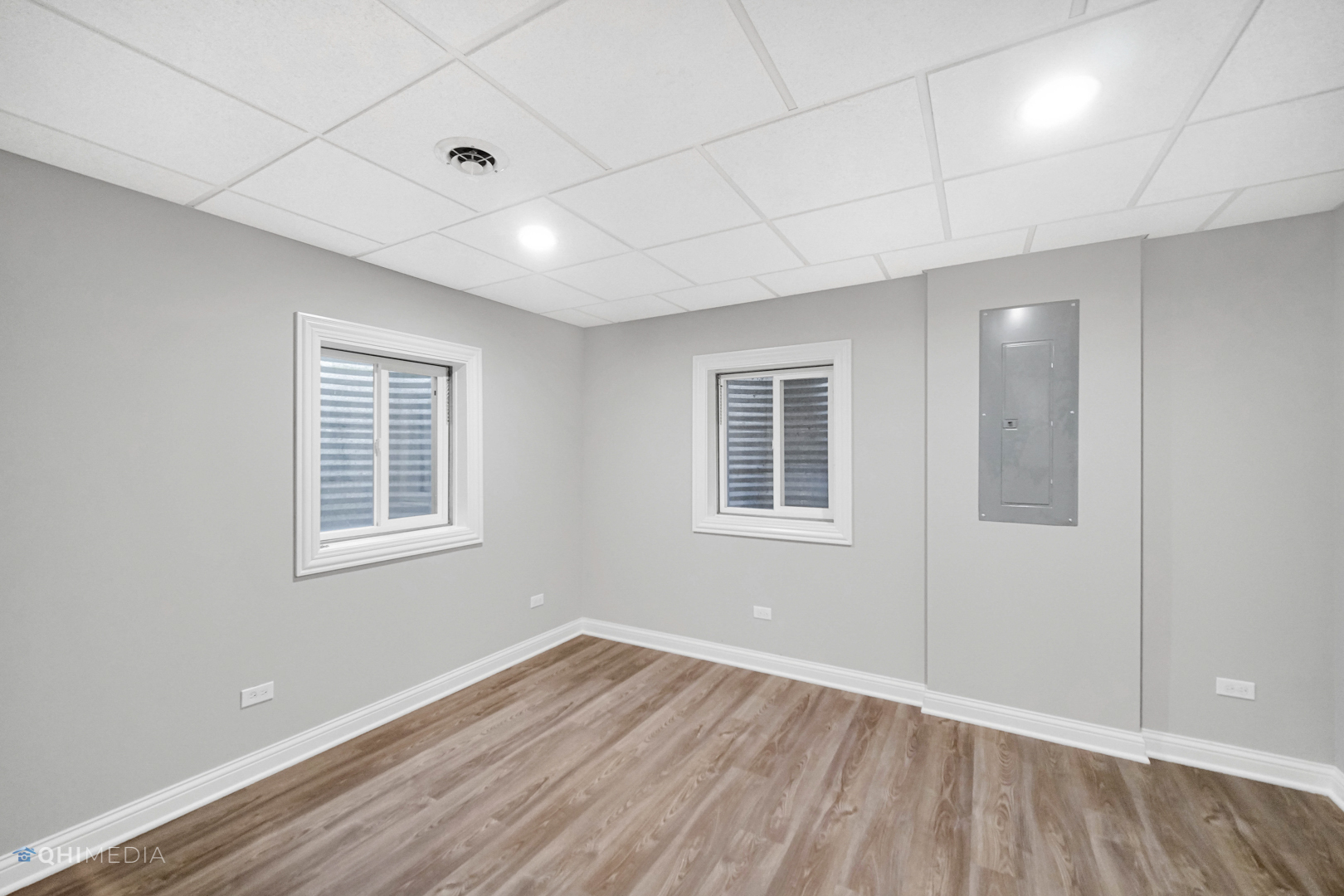 3101 Bennett Place Aurora, IL 60502 - Photo 17 of 30 a view of an empty room with wooden floor and a window