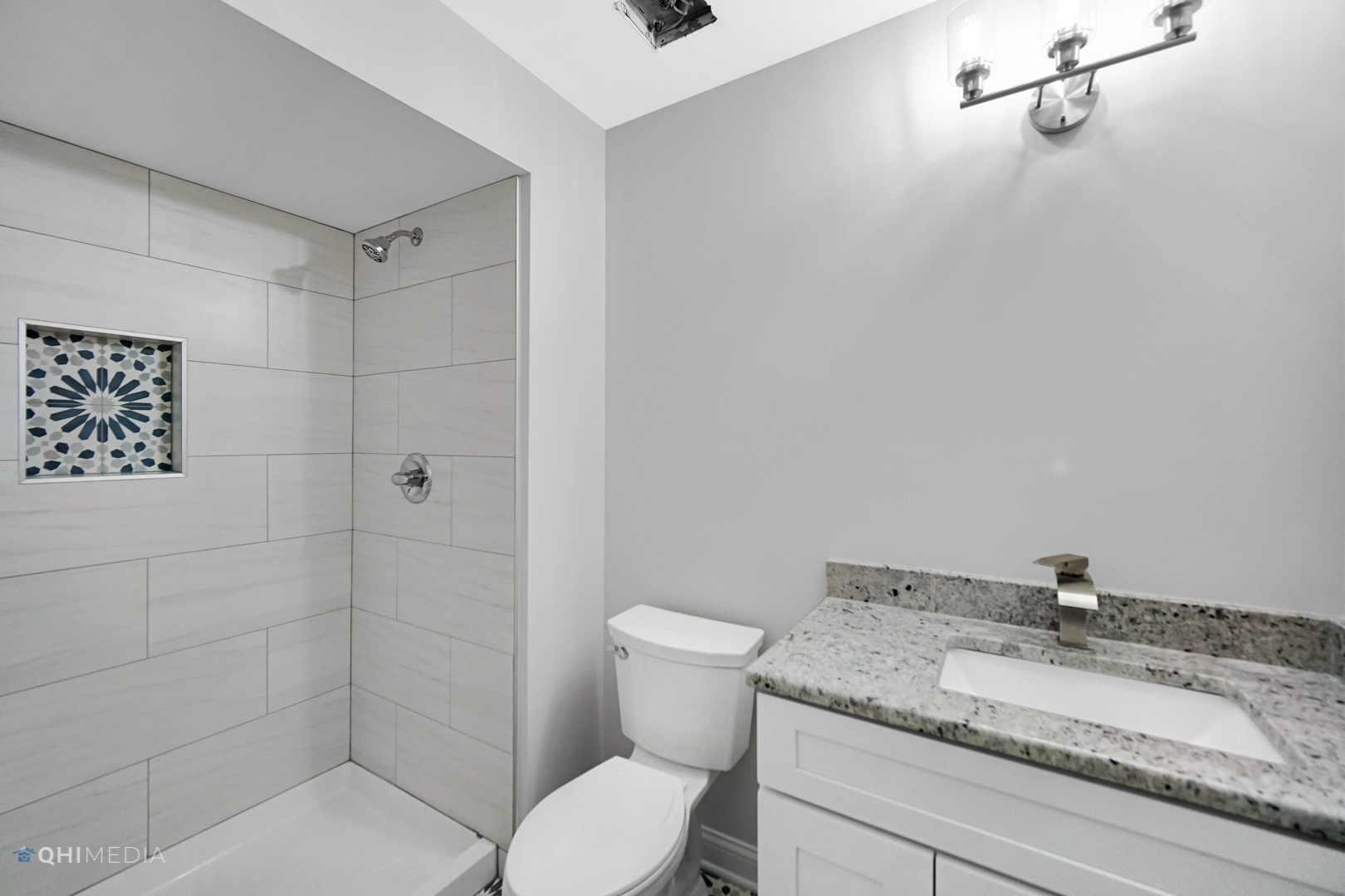 3101 Bennett Place Aurora, IL 60502 - Photo 2 of 30 a bathroom with a granite countertop sink a toilet and shower