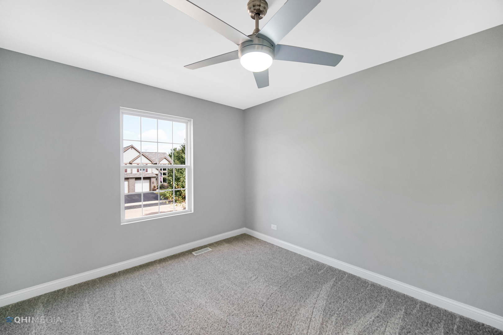 3101 Bennett Place Aurora, IL 60502 - Photo 21 of 30 an empty room with windows and fan