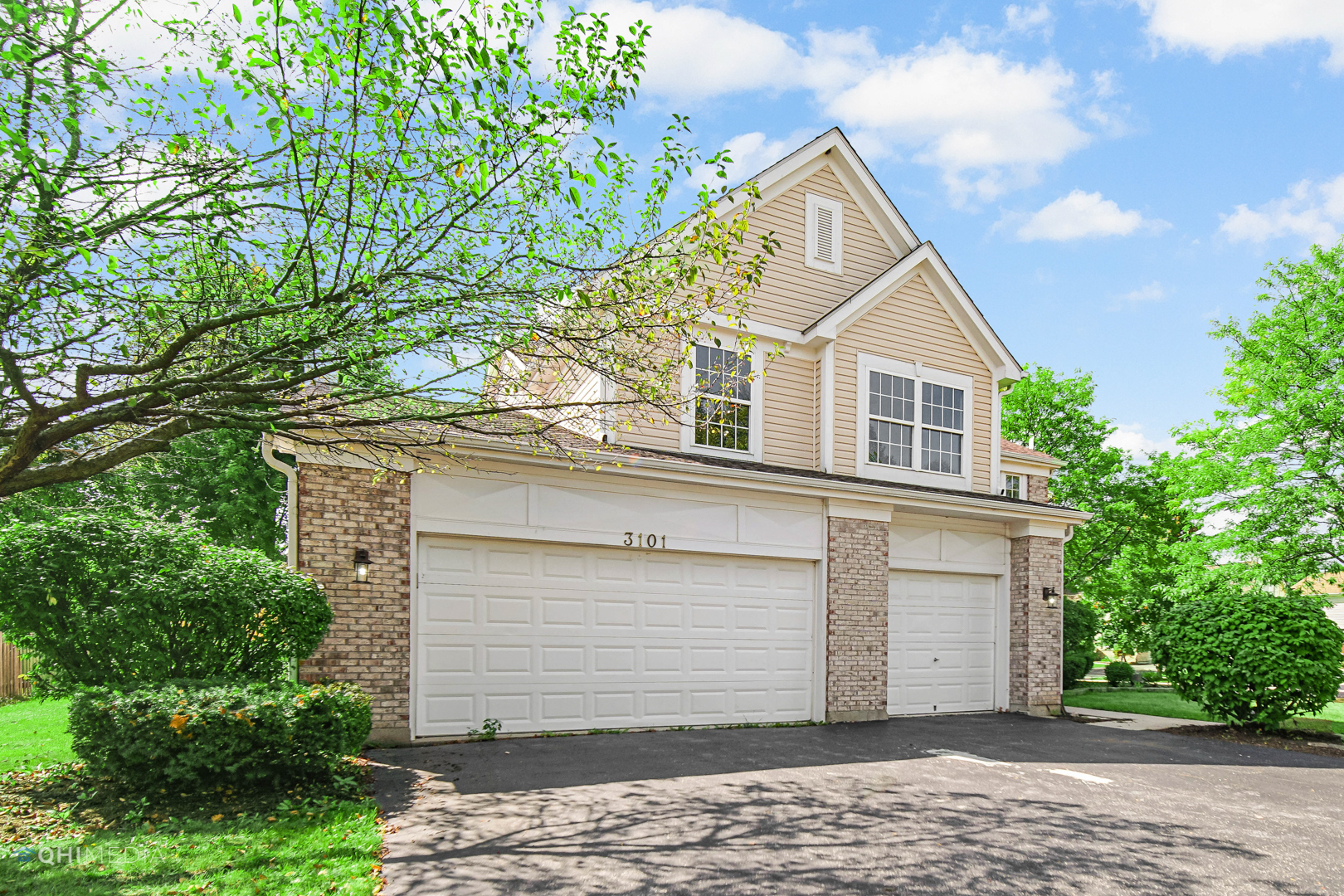 3101 Bennett Place Aurora, IL 60502 - Photo 3 of 30 a view of house with a tree and wooden fence