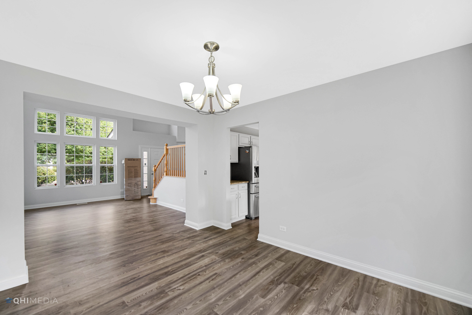 3101 Bennett Place Aurora, IL 60502 - Photo 8 of 30 a view of empty room with wooden floor and window
