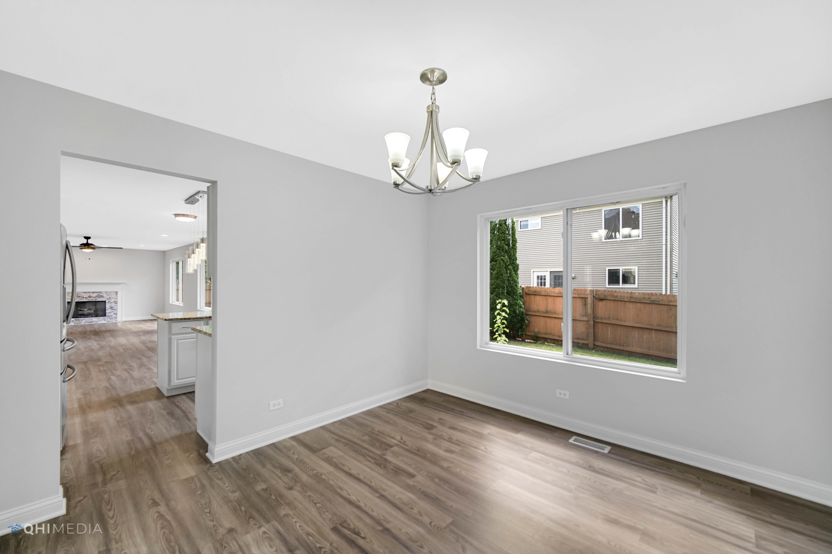 3101 Bennett Place Aurora, IL 60502 - Photo 9 of 30 a view of a room with wooden floor cabinet and windows
