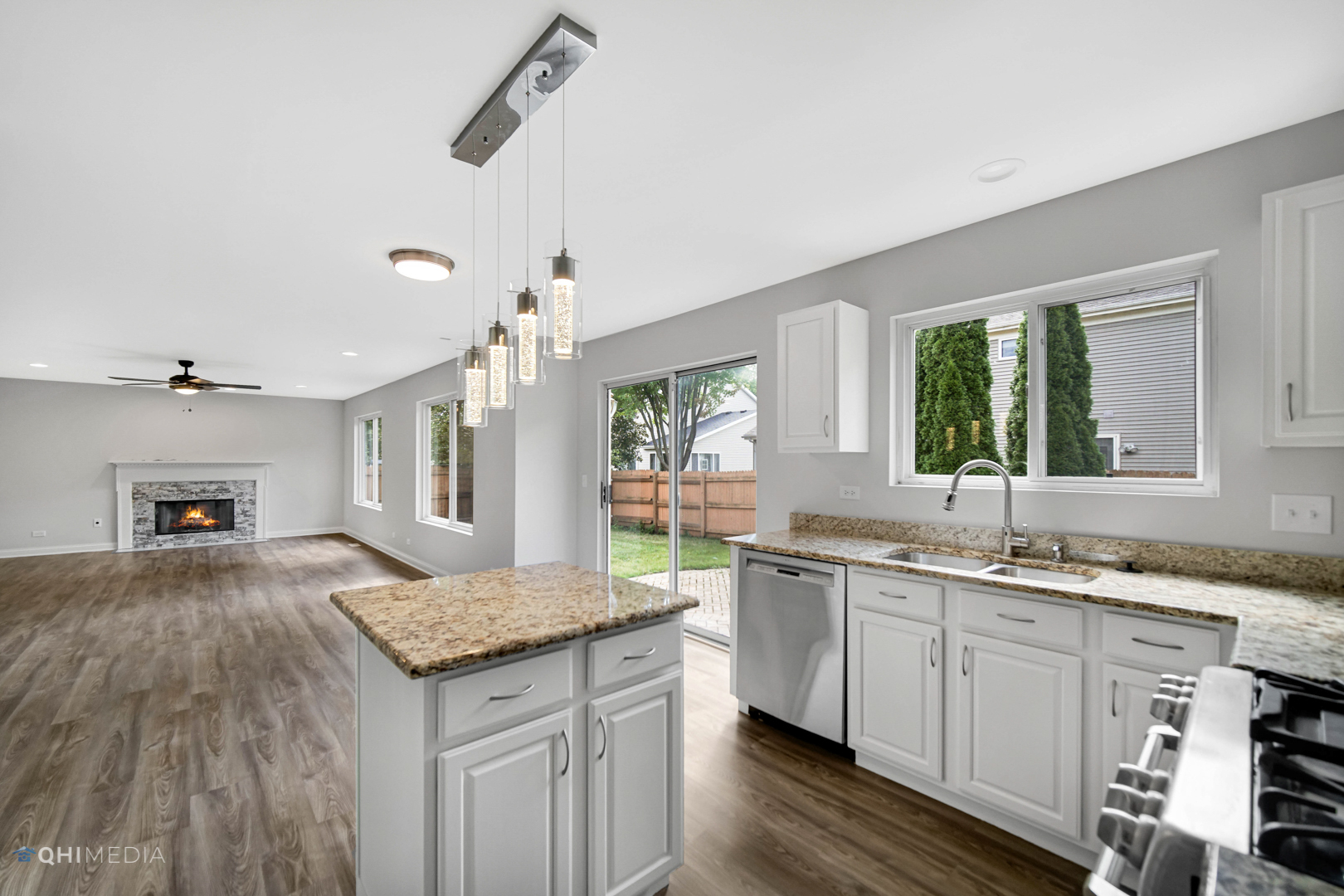 3101 Bennett Place Aurora, IL 60502 - Photo 10 of 30 a kitchen with sink cabinets and wooden floor
