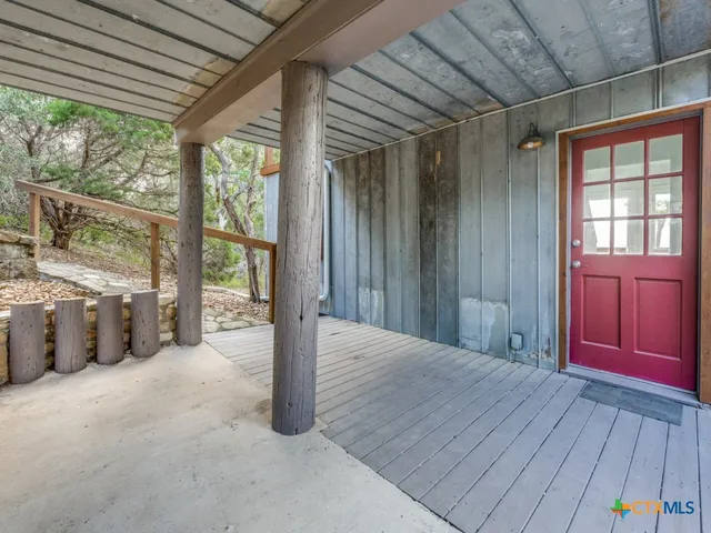 a view of a room with a large window