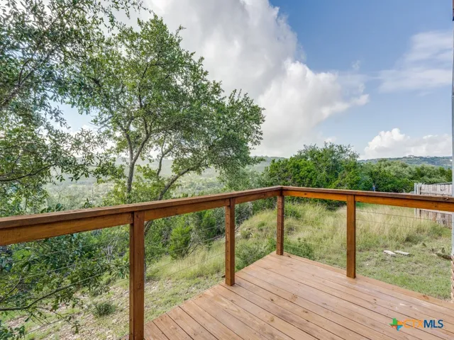 a view of lake from a balcony