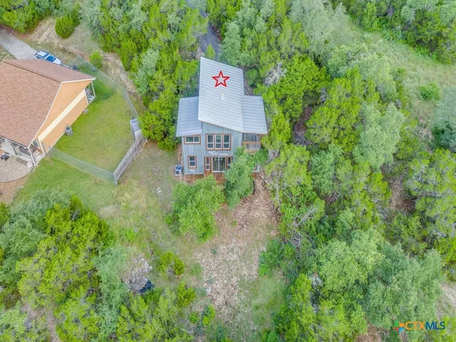 a view of a field with an ocean