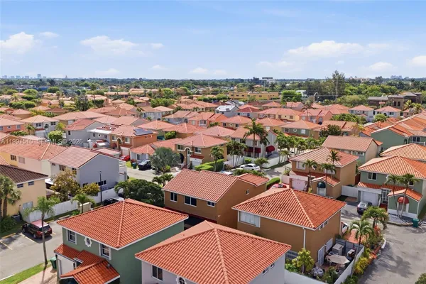 an aerial view of a city with lots of residential buildings