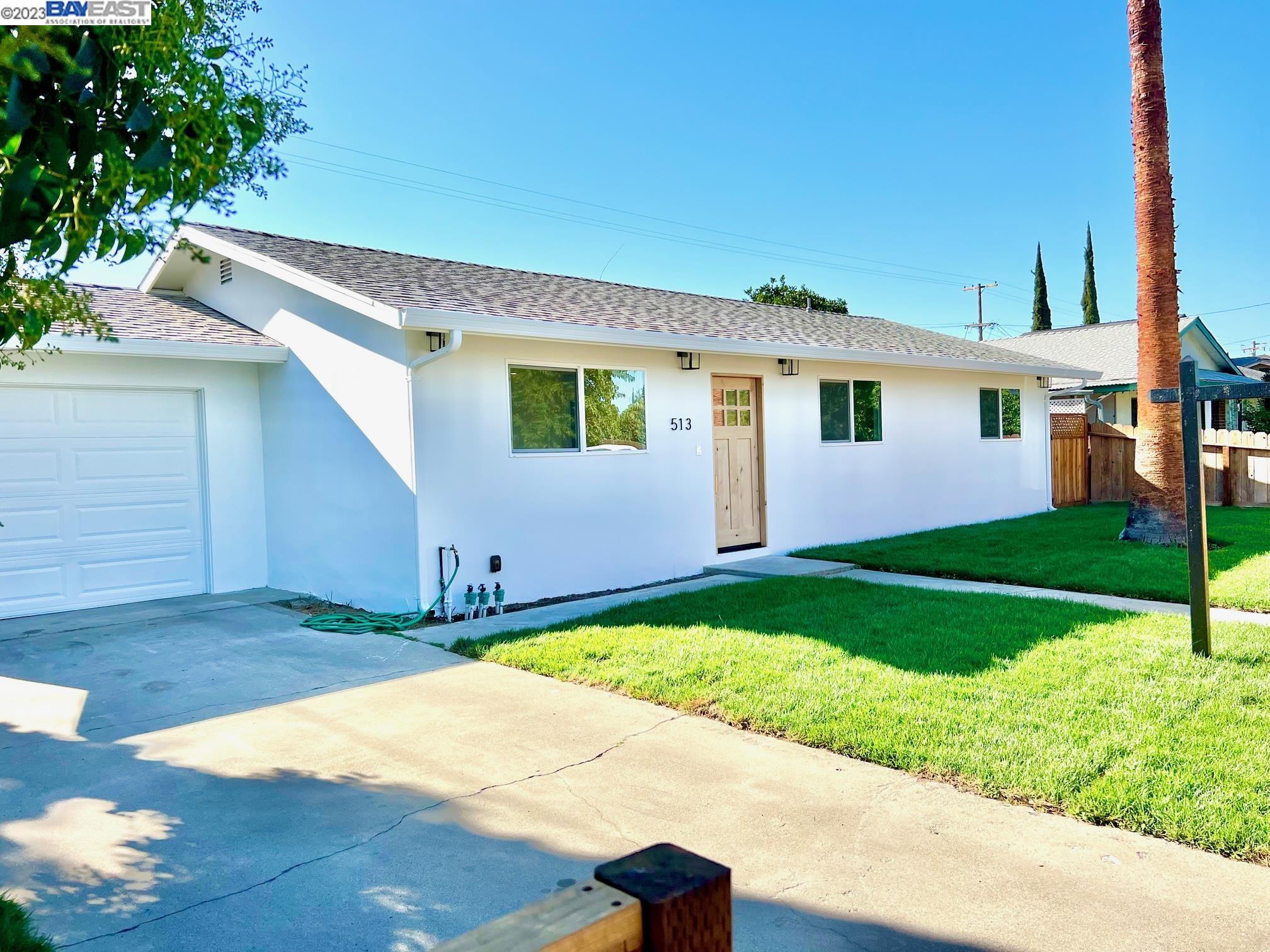 a front view of house with yard