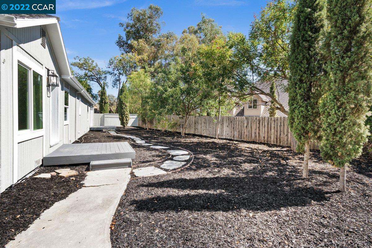 1966 Ayers Road Concord, CA 94521 - Photo 1 of 1 a view of a backyard with large trees