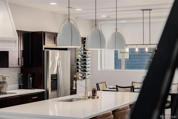 a kitchen with counter top space and appliances