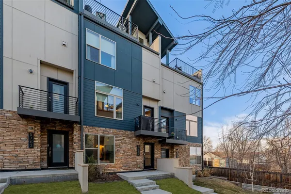 a view of a building with a iron gate