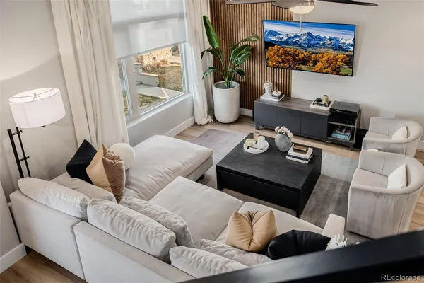 a living room with furniture and a window