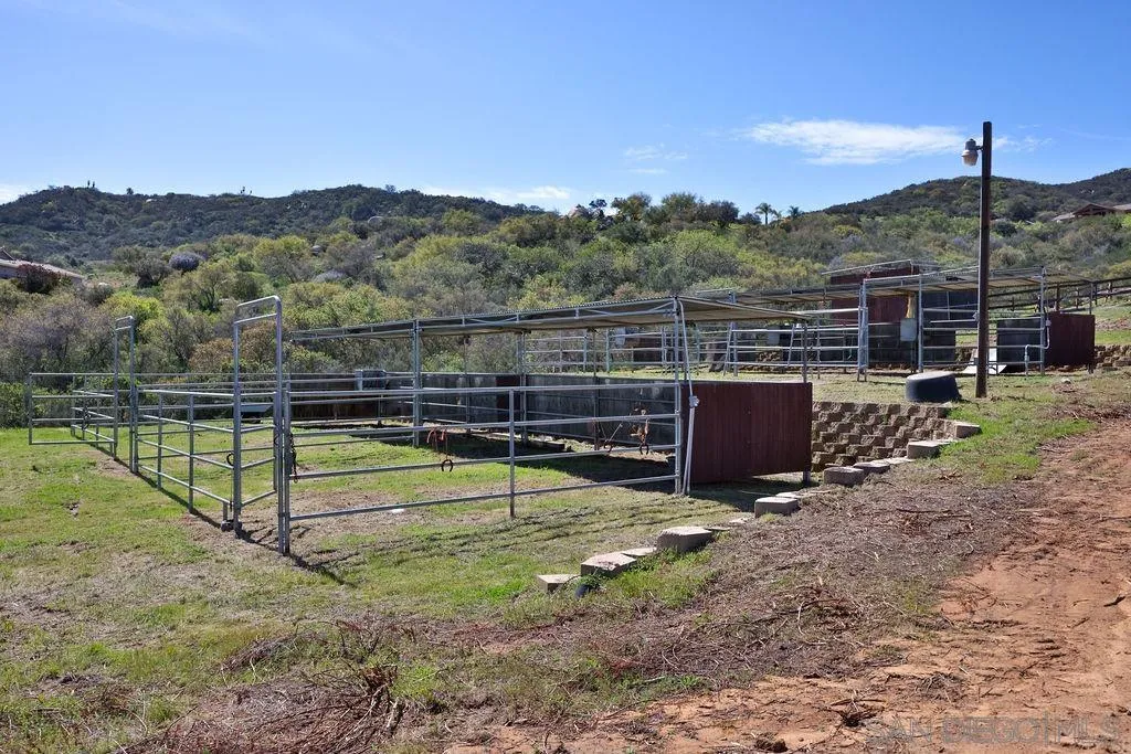 15775 Castle Peak Lane Jamul, CA 91935 - Photo 47 of 56 a view of a terrace with a table and chairs