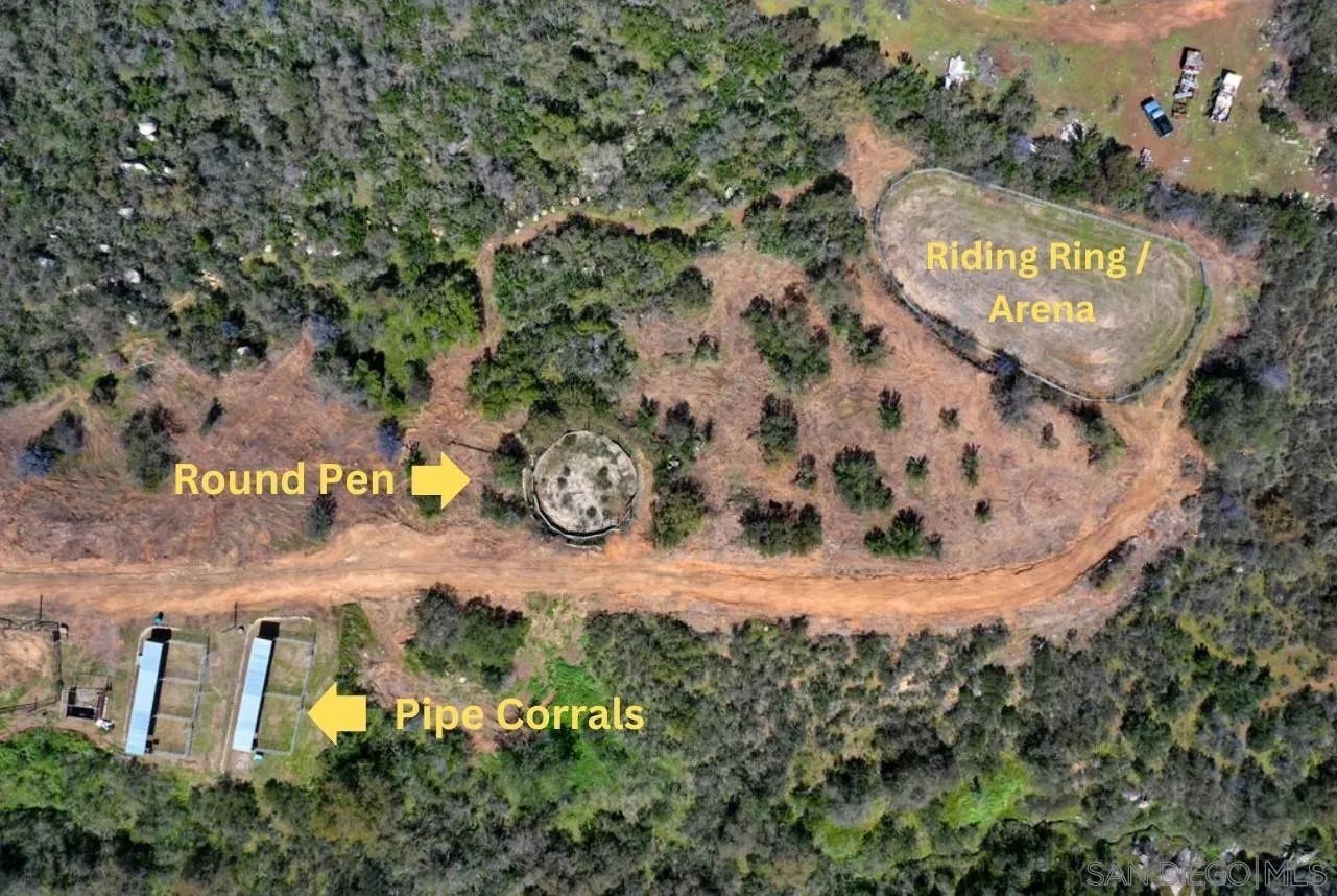 15775 Castle Peak Lane Jamul, CA 91935 - Photo 53 of 56 an aerial view of a house with a yard and large trees