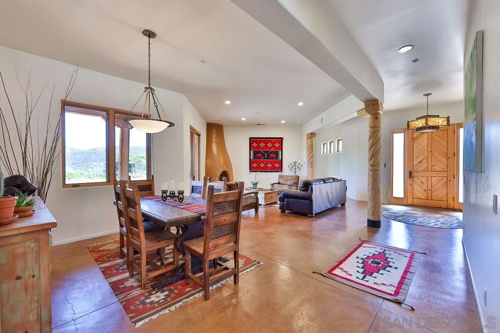 15775 Castle Peak Lane Jamul, CA 91935 - Photo 7 of 56 a living room with furniture and wooden floor