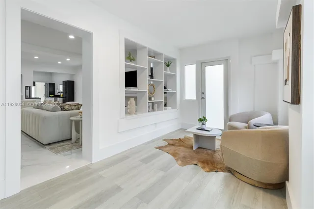 a living room with furniture and a table