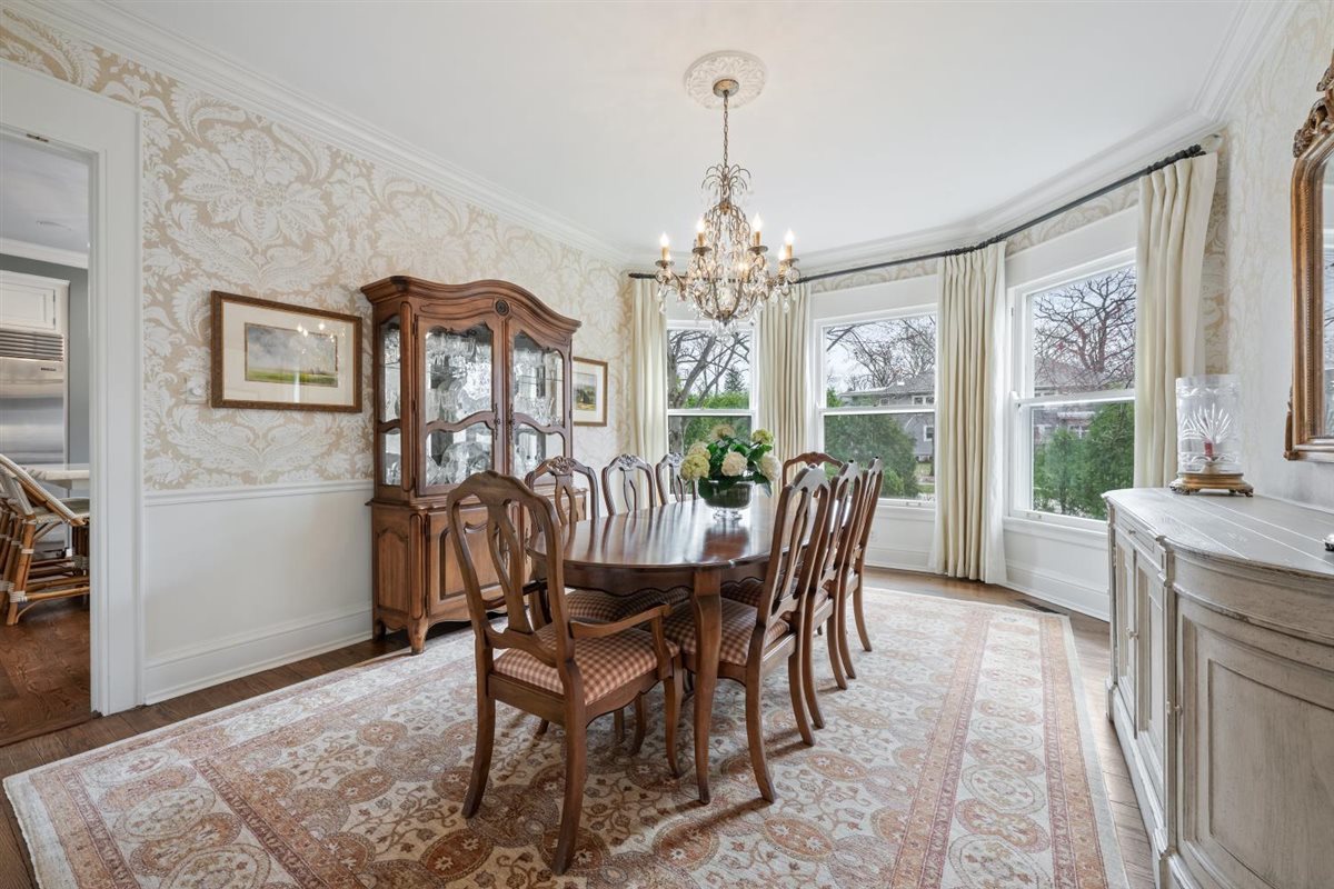 307 Abbotsford Road Kenilworth, IL 60043 - Photo 11 of 57 a view of a dining room with furniture window and outside view