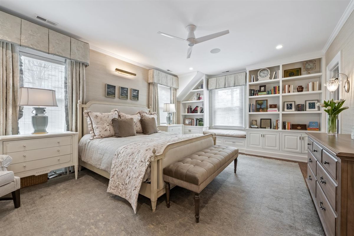 307 Abbotsford Road Kenilworth, IL 60043 - Photo 26 of 57 a spacious bedroom with a bed and a large window