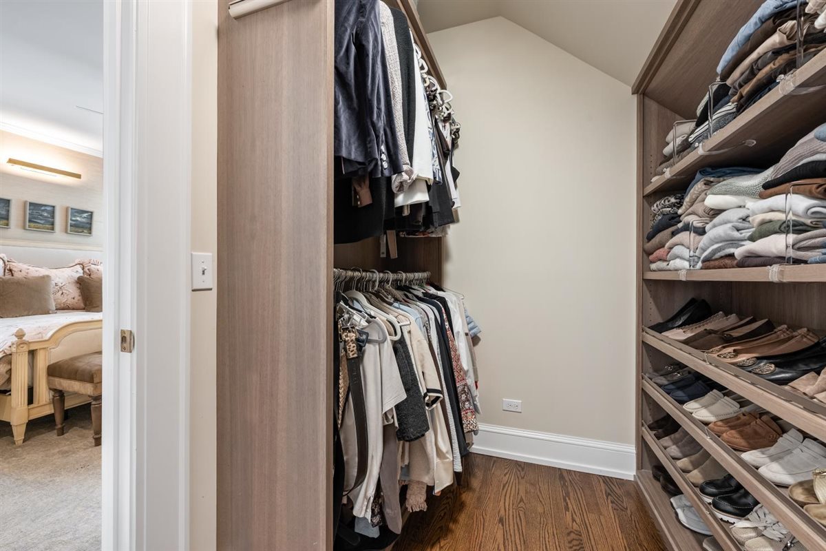 307 Abbotsford Road Kenilworth, IL 60043 - Photo 30 of 57 a view of walk in closet with clothes and shoes