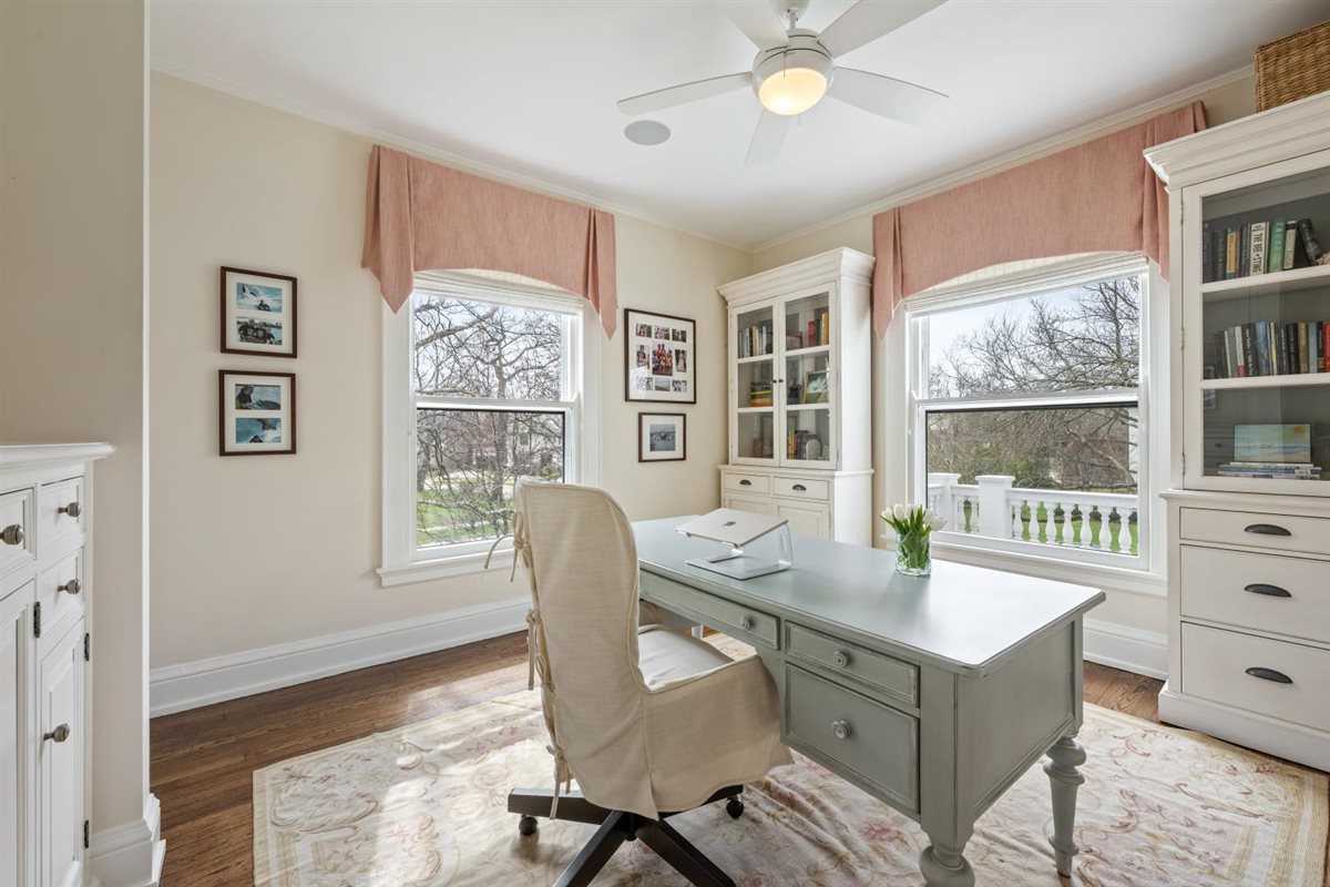 307 Abbotsford Road Kenilworth, IL 60043 - Photo 37 of 57 a view of a dining room with furniture window and wooden floor