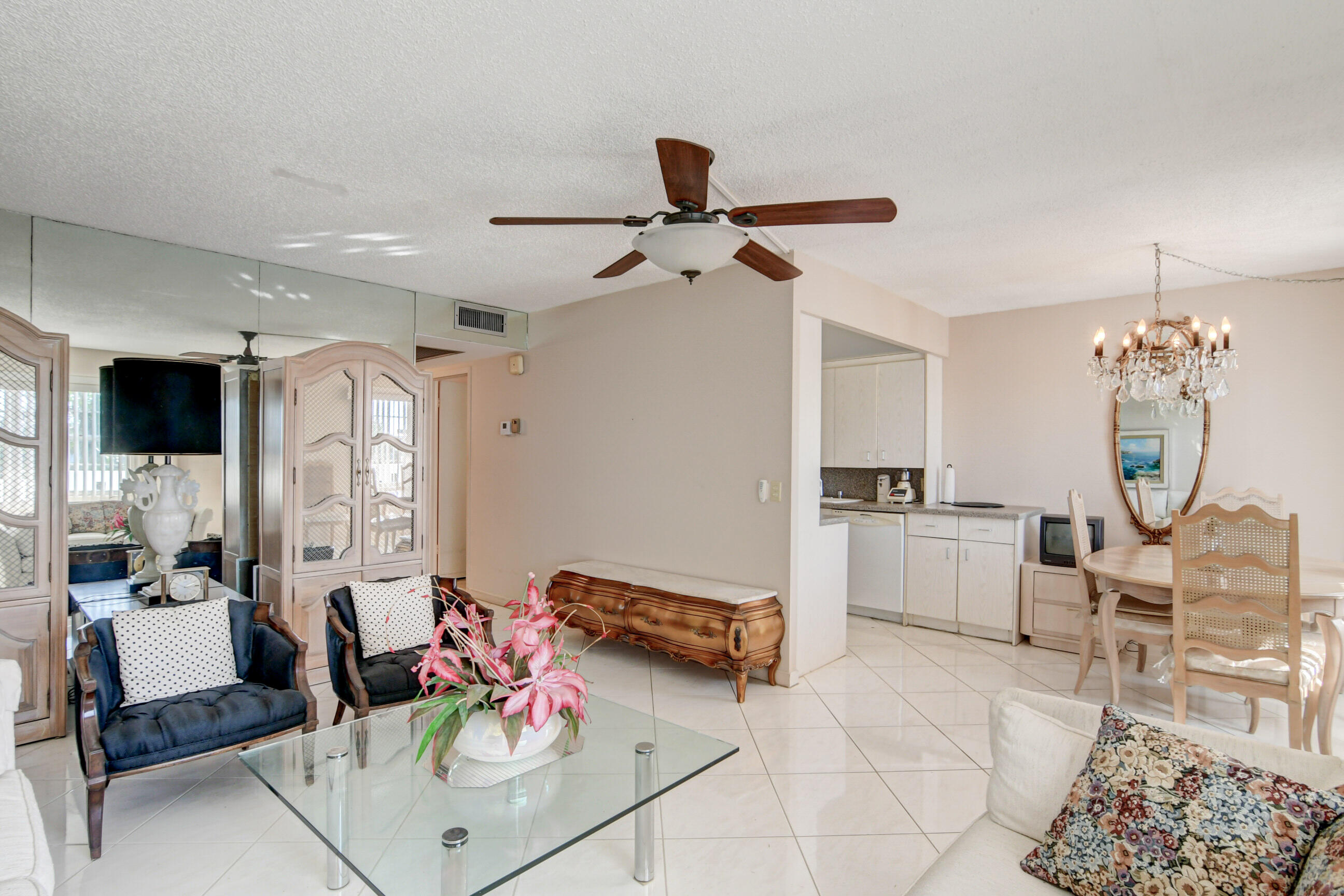 4044 Exeter C Boca Raton, FL 33434 - Photo 12 of 69 a living room with furniture and a flat screen tv