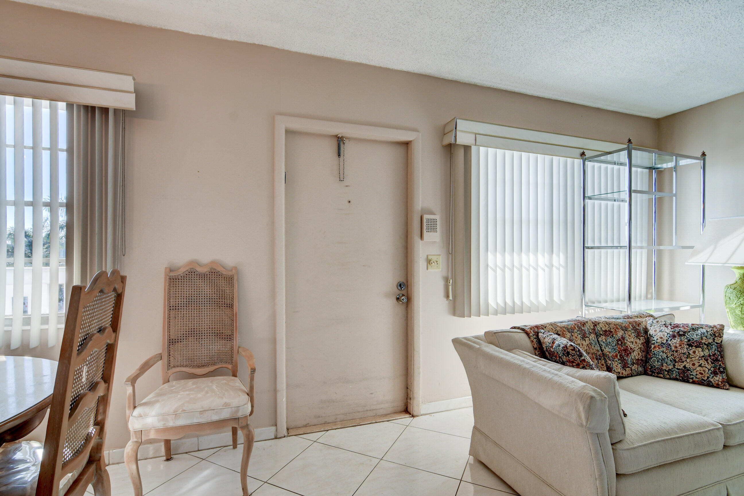 4044 Exeter C Boca Raton, FL 33434 - Photo 16 of 69 a living room with furniture and a window