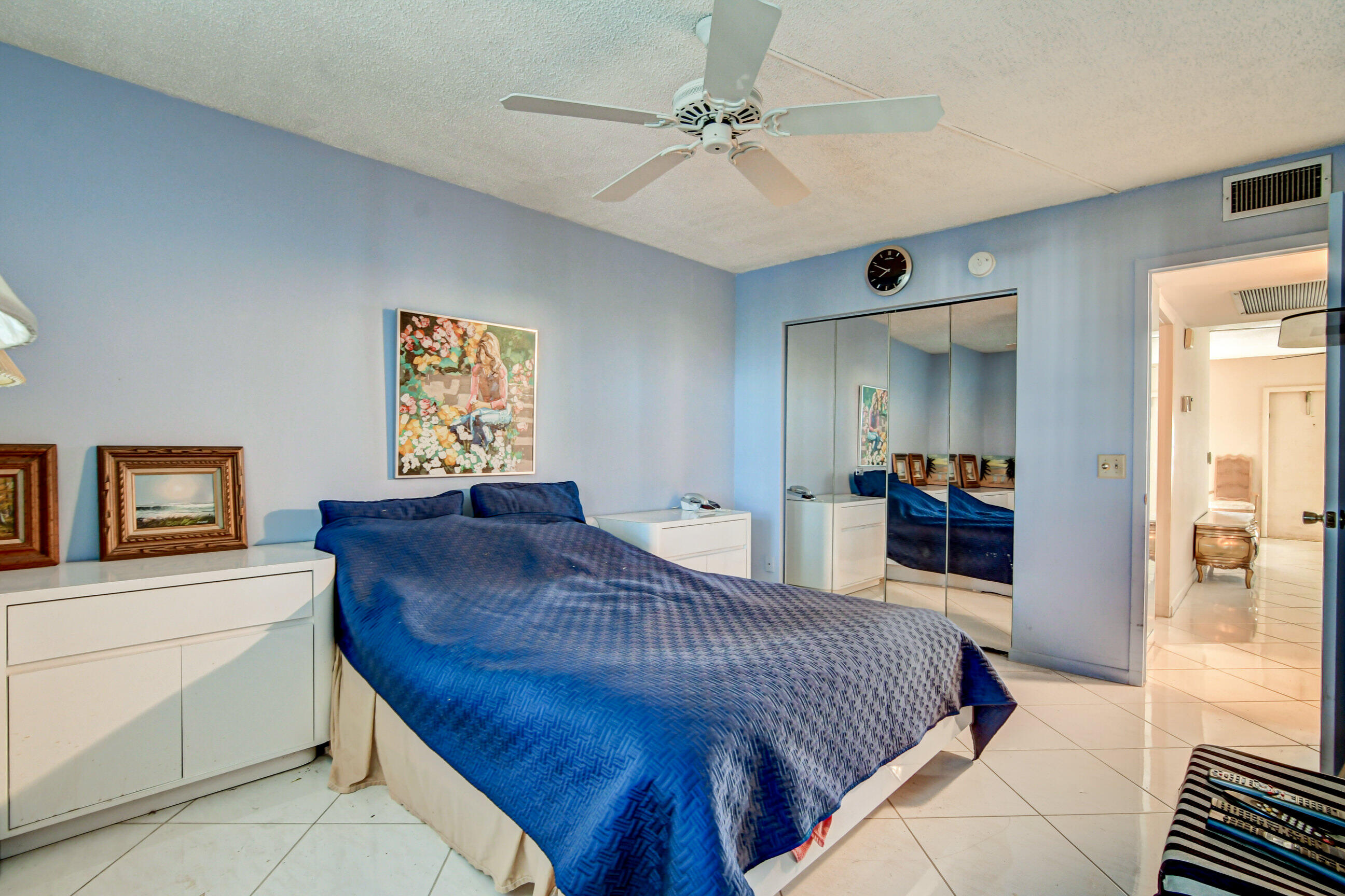 4044 Exeter C Boca Raton, FL 33434 - Photo 19 of 69 a living room with furniture and a chandelier