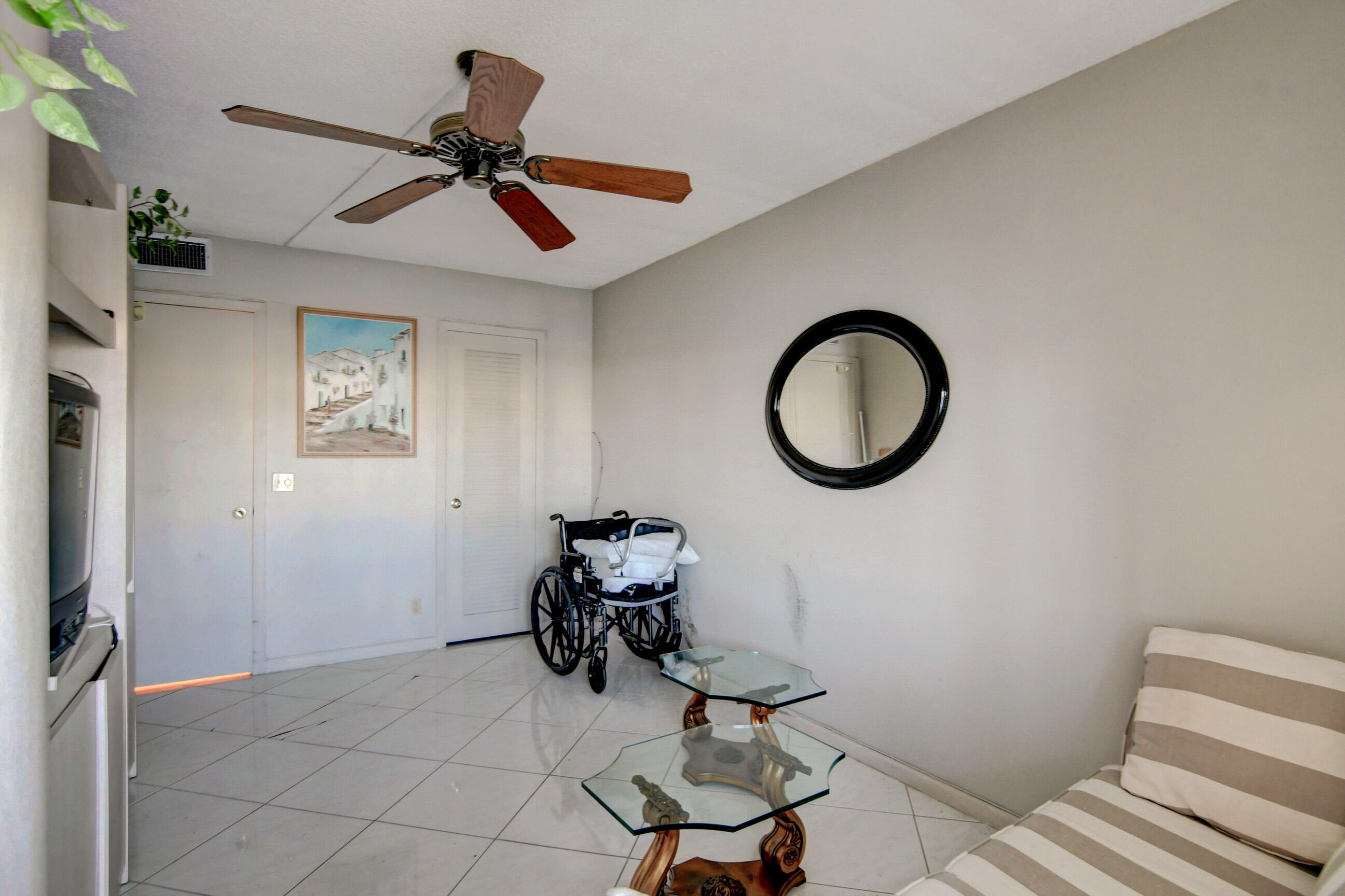 4044 Exeter C Boca Raton, FL 33434 - Photo 22 of 69 a view of a room with gym equipment