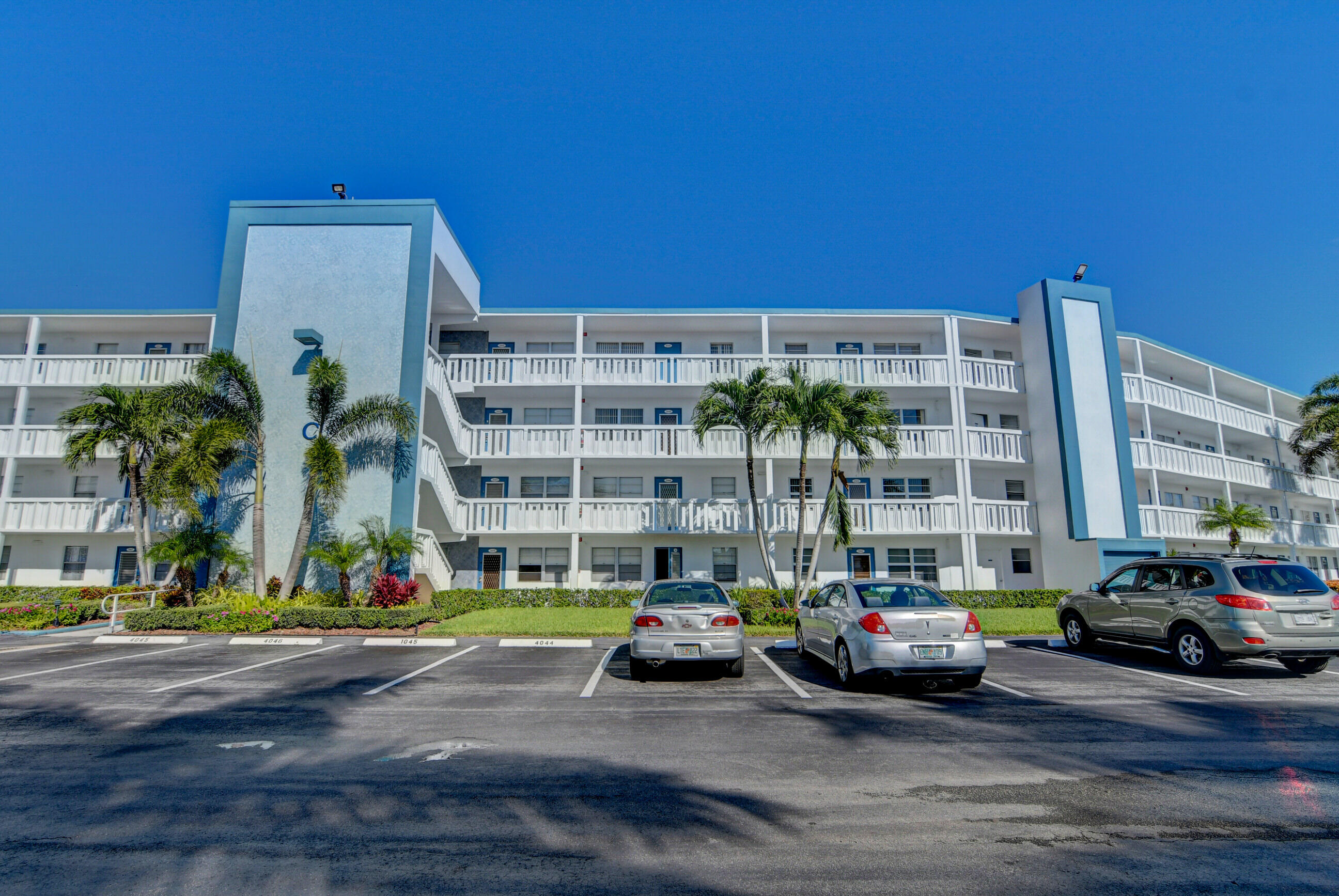 4044 Exeter C Boca Raton, FL 33434 - Photo 27 of 69 a car parked in front of a building