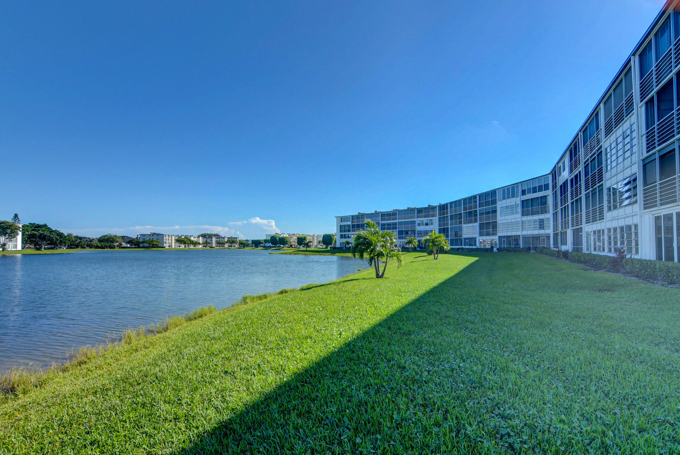 4044 Exeter C Boca Raton, FL 33434 - Photo 37 of 69 a view of a lake with a yard