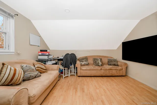 a view of room with flat screen tv