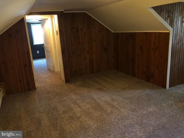 a view of hallway with stairs