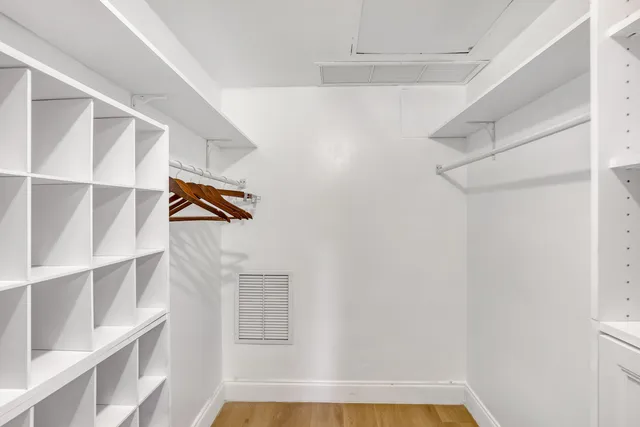 a view of a room with a large window