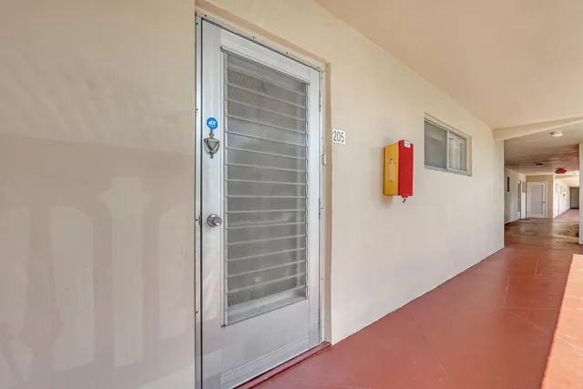 a view of roof deck with patio